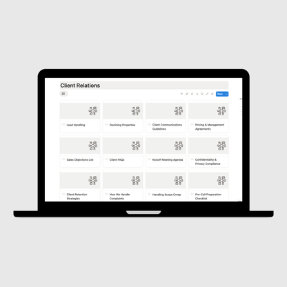 Laptop displaying a client relations management software interface on a light gray background