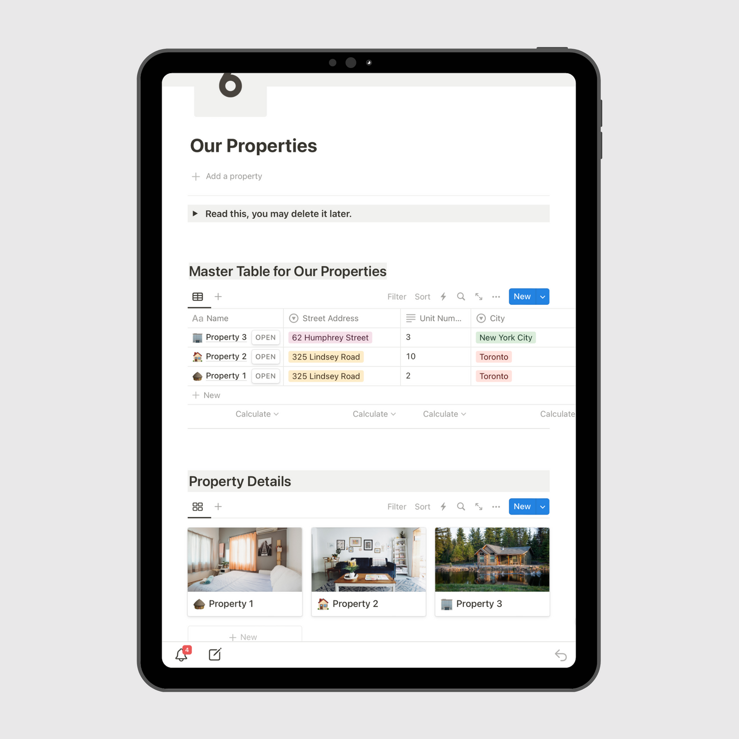 Notion Airbnb Operations Manual template displayed on a tablet, showing a master property management table with addresses, city tags, and image previews for multiple rental listings.