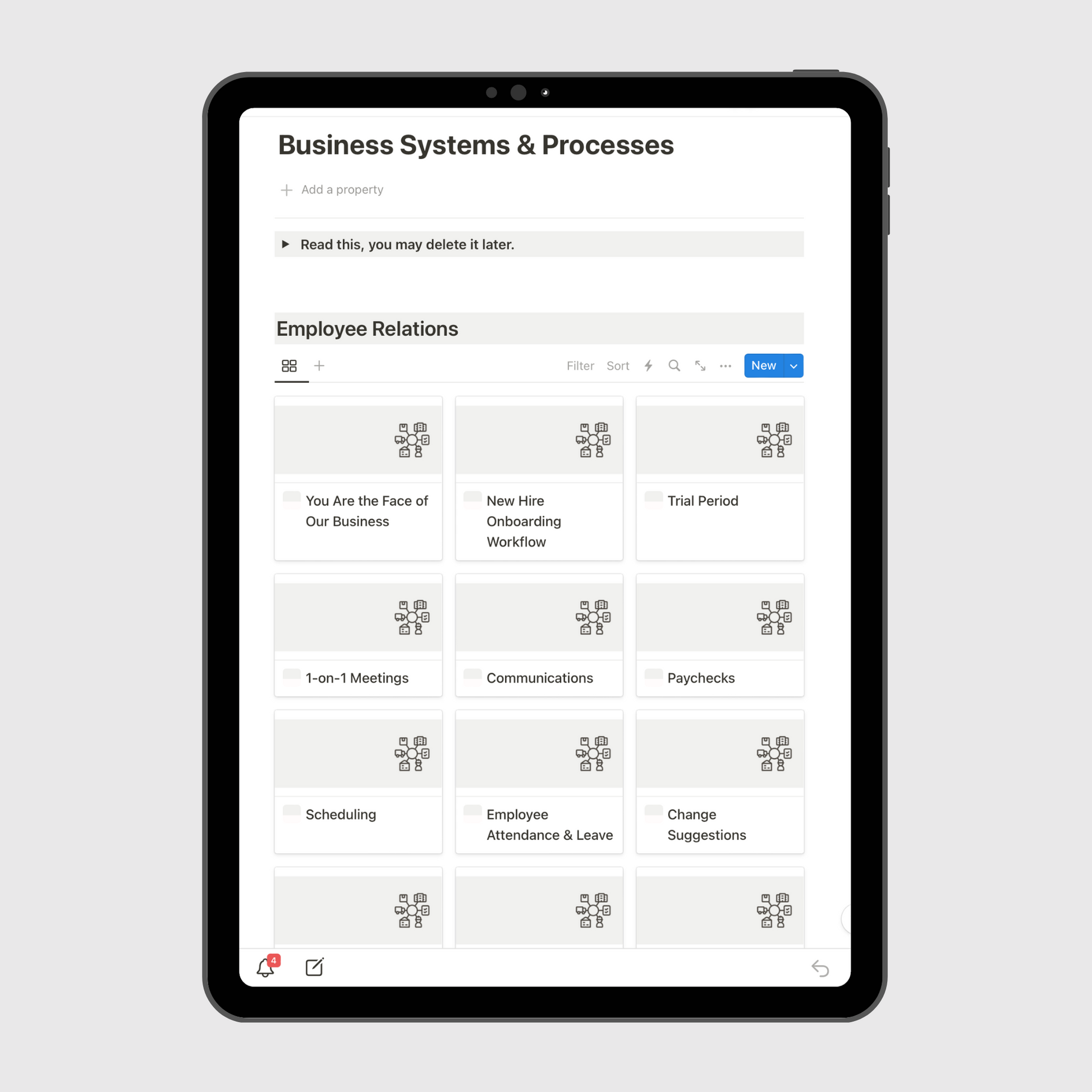 Notion Airbnb Operations Manual template shown on a tablet, highlighting the Business Systems & Processes section with Employee Relations templates like onboarding, communications, payroll, and scheduling tools.