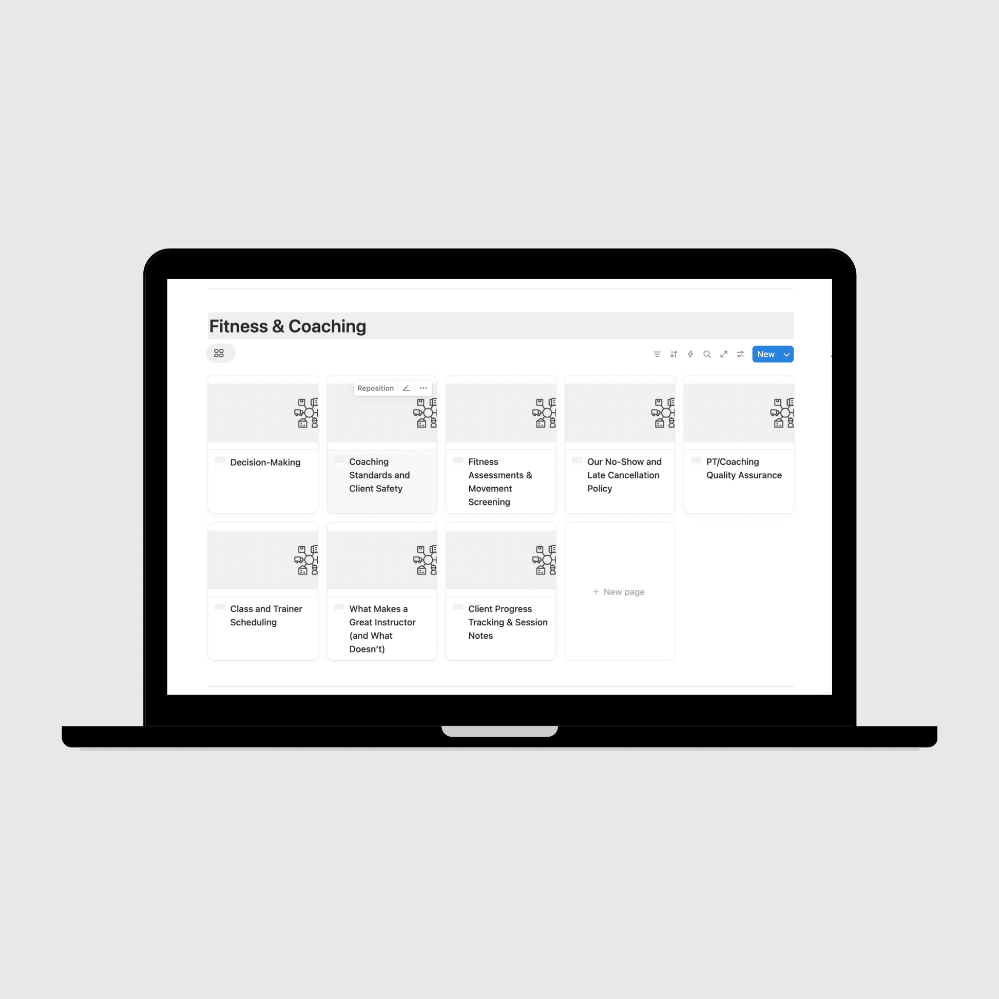Laptop displaying a digital manual on a light gray background