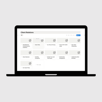 Laptop displaying a digital manual on a light gray background