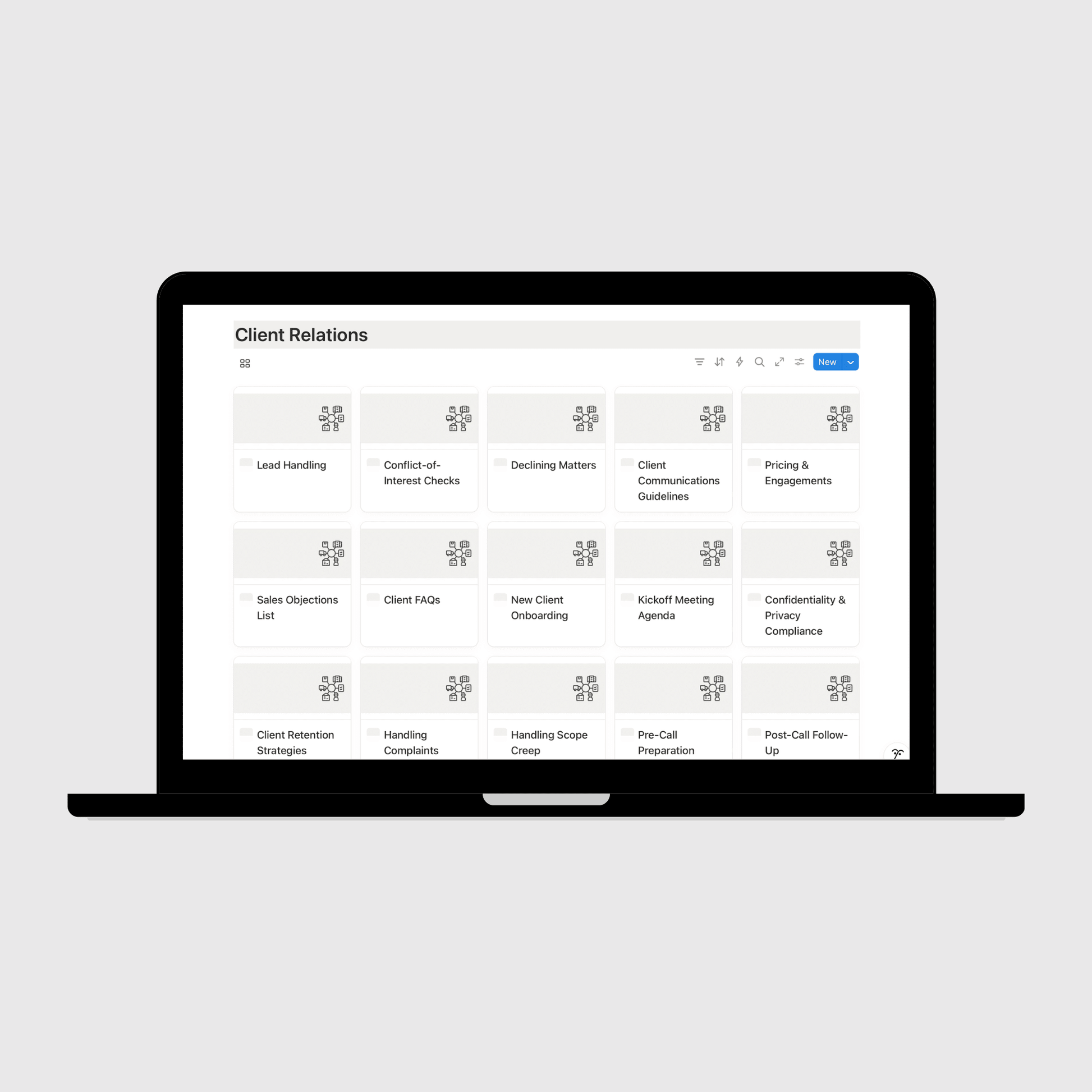 Laptop displaying a client relations management software interface on a light gray background
