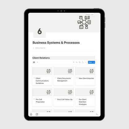 Notion Consulting Firm Operations Manual template displayed on a tablet, showing the Business Systems & Processes section with Client Relations templates for communication, document management, and client retention strategies.