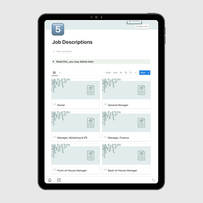 Tablet screen displaying the “Job Descriptions” section of a Notion Operations Manual template, featuring organized role cards for Owner, General Manager, Marketing & PR Manager, Finance Manager, Front-of-House Manager, and Back-of-House Manager.